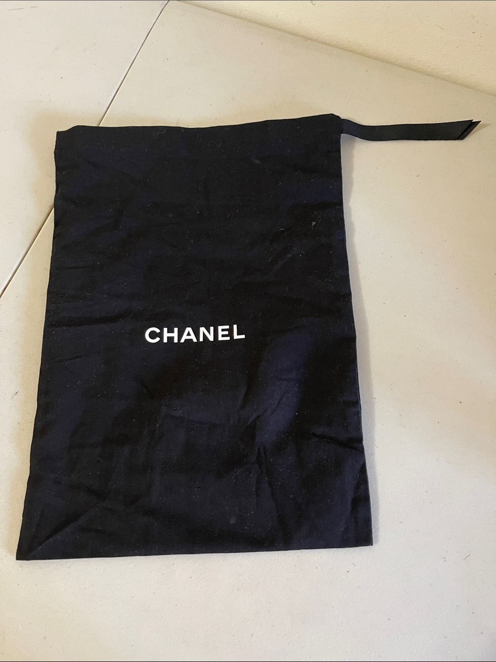 CHANEL Black Drawstring Dust Pouch with White Logo